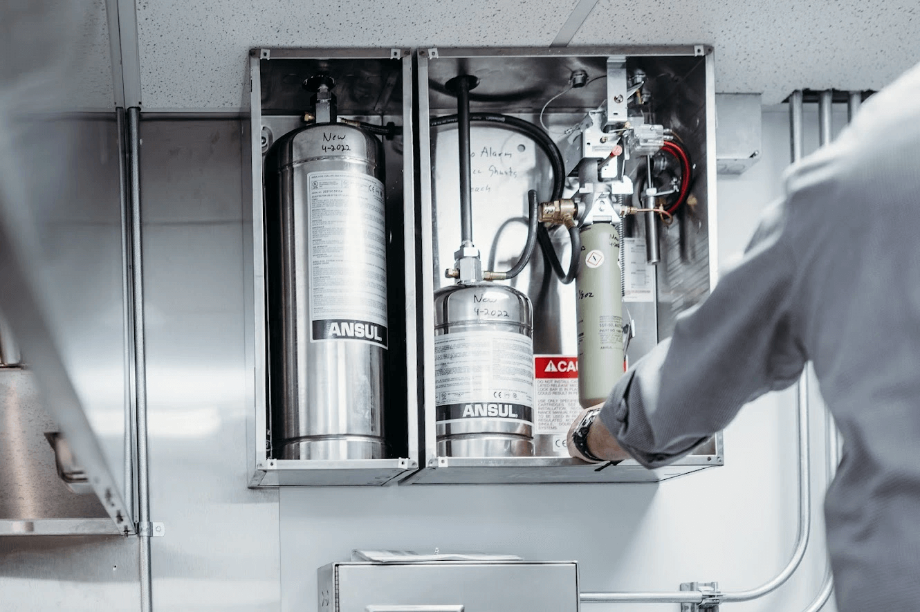 A fire suppression system designed to protect a kitchen